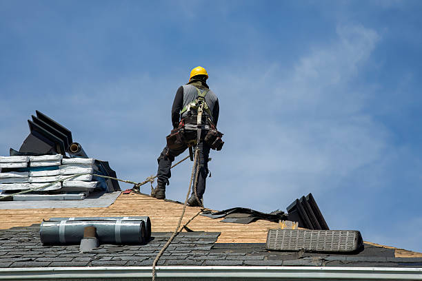 Professional Roof Replacement technician working in Colrain, MA